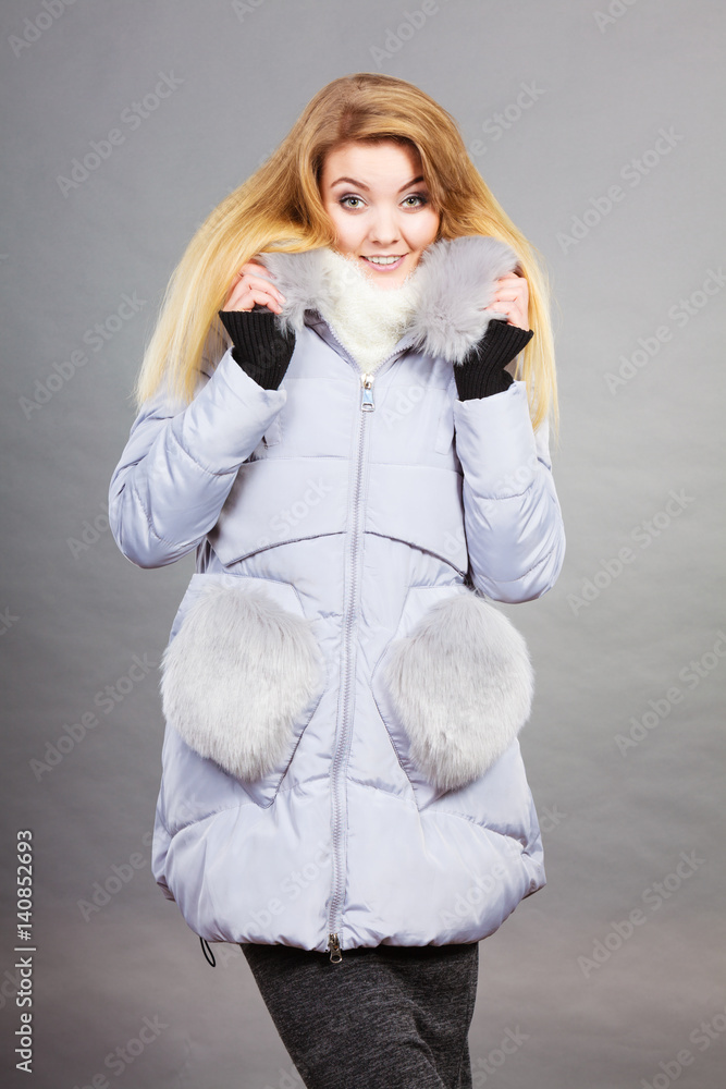 Woman wearing winter warm furry jacket Woman wearing winter warm furry jacket
