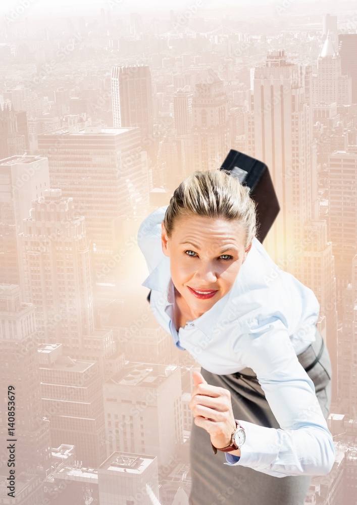 Businesswoman holding briefcase and running against cityscape Businesswoman holding briefcase and running against cityscape