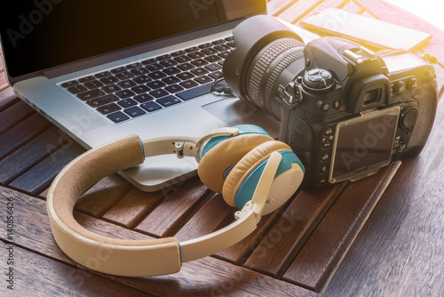 Modern laptop and gears photo