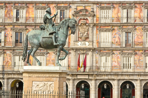 Statue of Philip III with Bakery House on background in Madrid, Spain