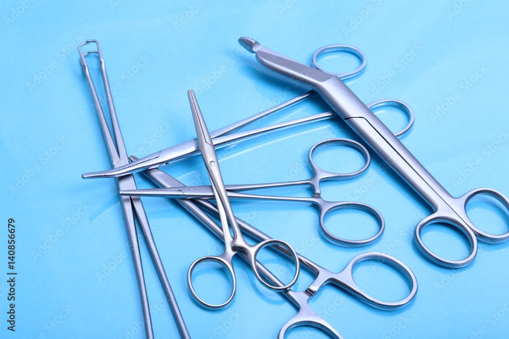 Medical and surgery instruments isolated in mirror background Medical and surgery instruments isolated in mirror background