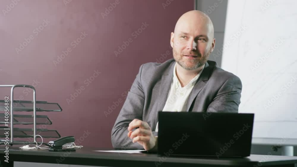 Bald Middle-Aged Businessman Receives Good News Bald Middle-Aged Businessman Receives Good News