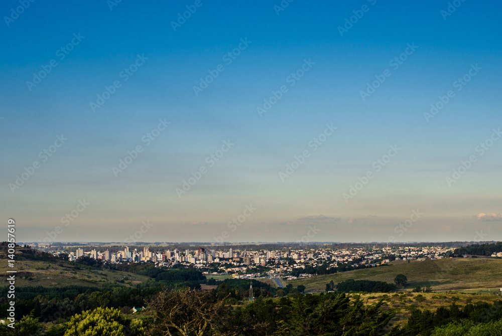 Obraz premium Panoramic view on the city of Tandil in Argentina from the hill. Landscape and cityscape.