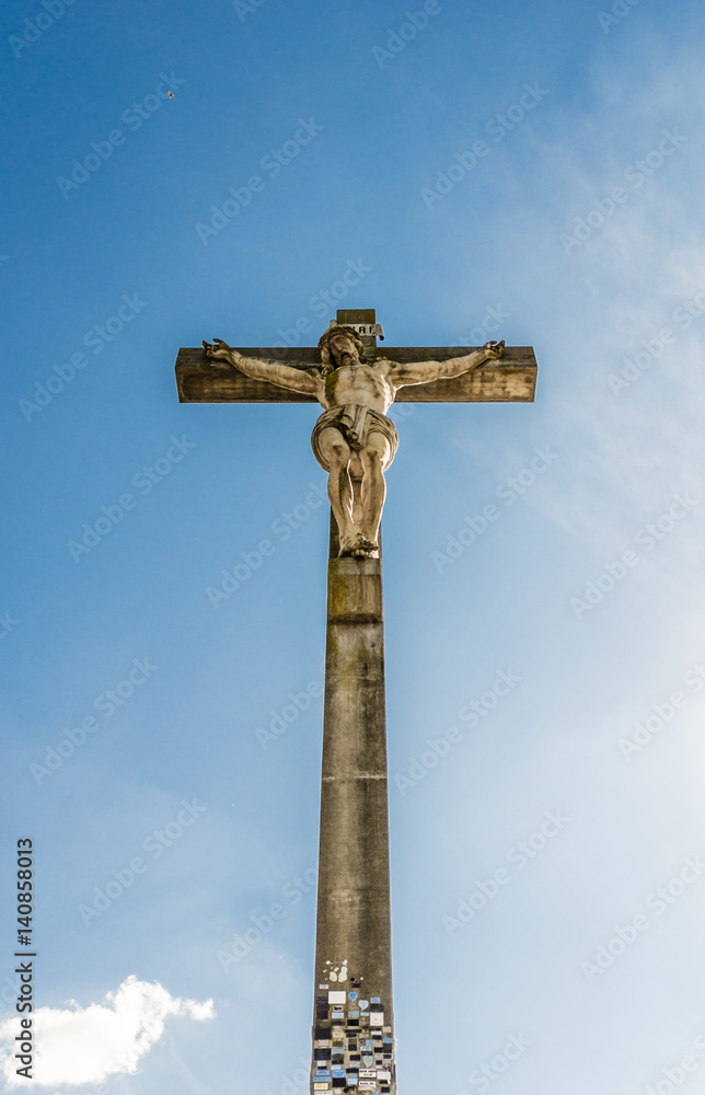 Monument of crucified Jesus Christ in Tandil town, Argentina, on a sunny day with blue sky