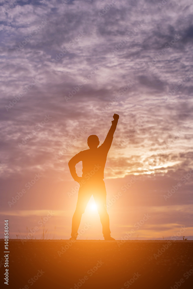 Man show hands silhouette sunset background