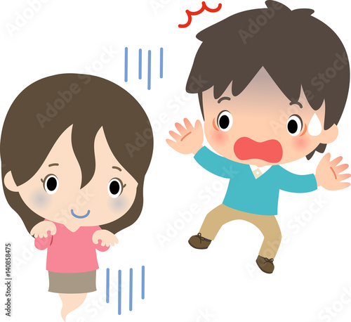 幽霊と驚いている男性