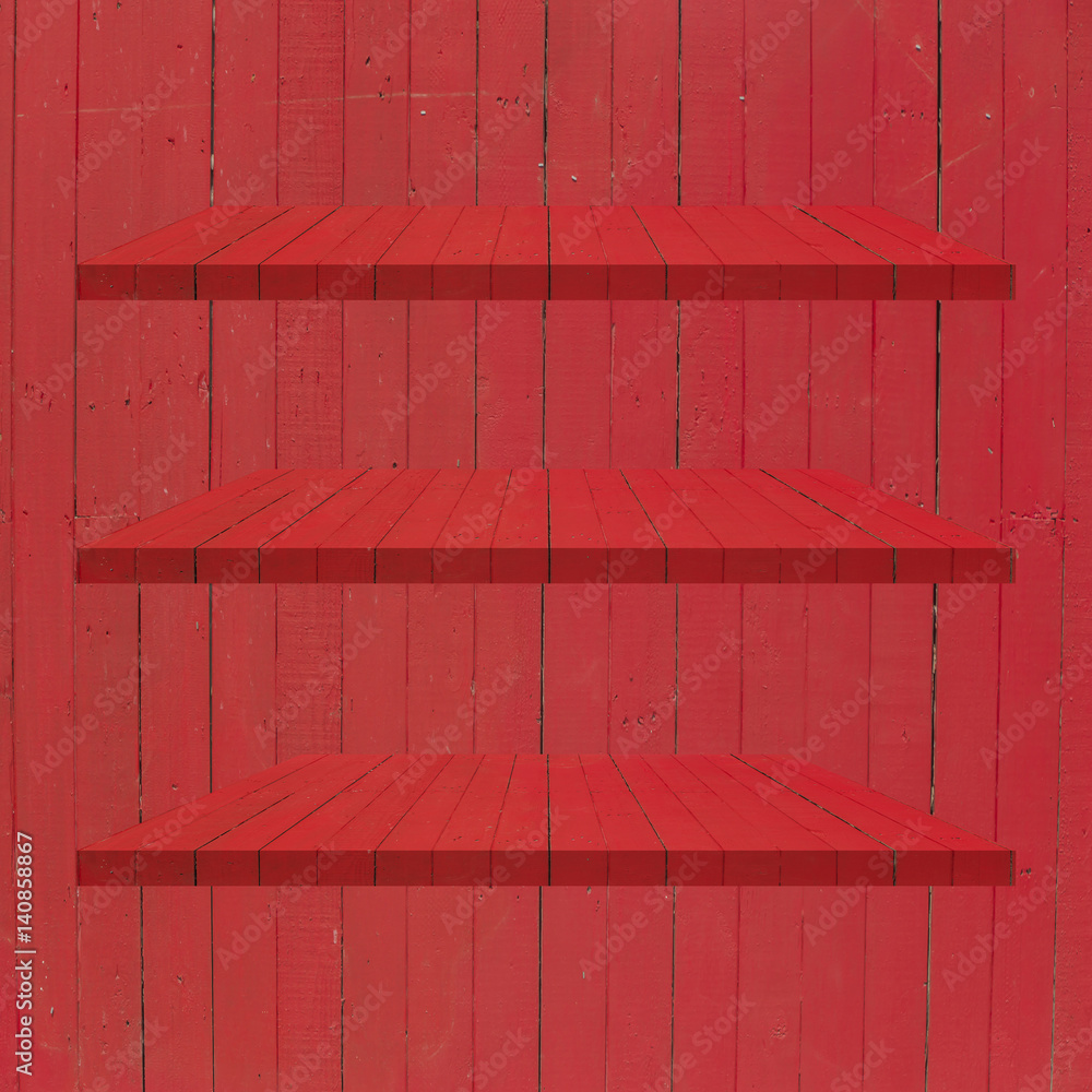 3 Red Wood Shelves Table on red wooden wall background 3 Red Wood Shelves Table on red wooden wall background
