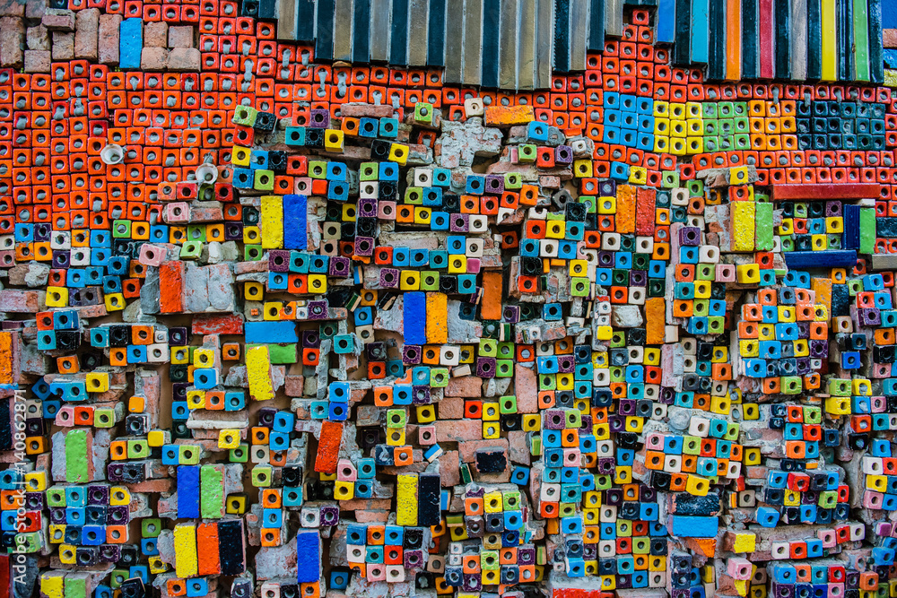 Fototapeta premium Multicolor bricks, exterior wall as background