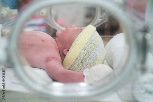 New born baby in hospital after delivery, mom and baby concept