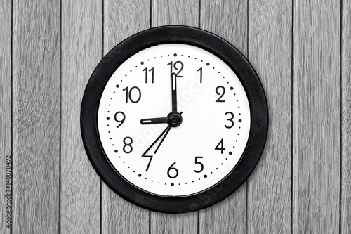 Alarm clock on wooden panels wall, office style decor mock up