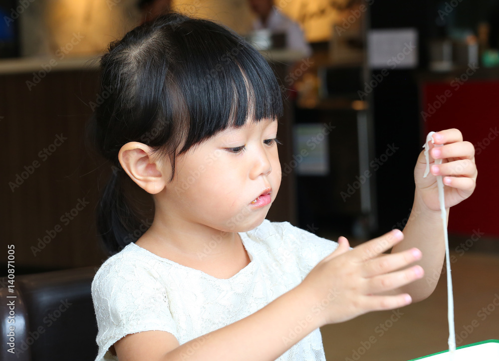 Adorable child girl eating Deep-fried Cheese Stick Adorable child girl eating Deep-fried Cheese Stick