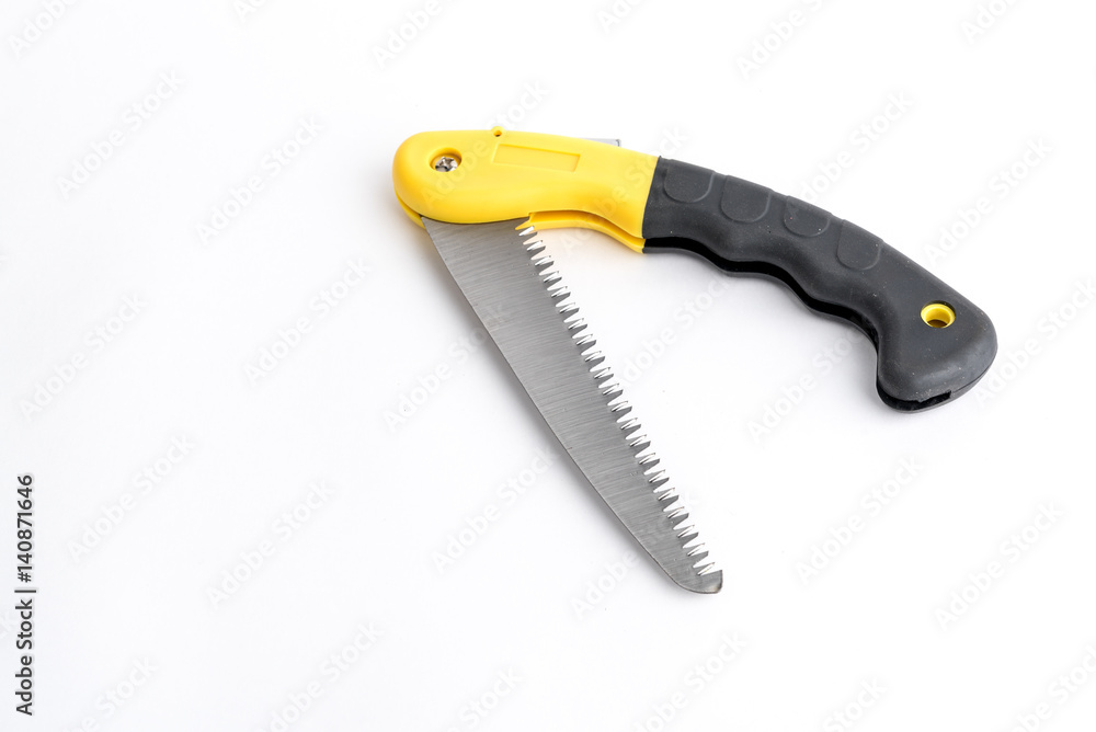 Folding garden hacksaw black-yellow saw on white background, saw with handle lock Folding garden hacksaw black-yellow saw on white background, saw with handle lock