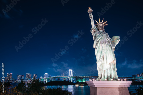 View from Odaiba of rainbow bridge and statue of liberty - Tokyo  Japan