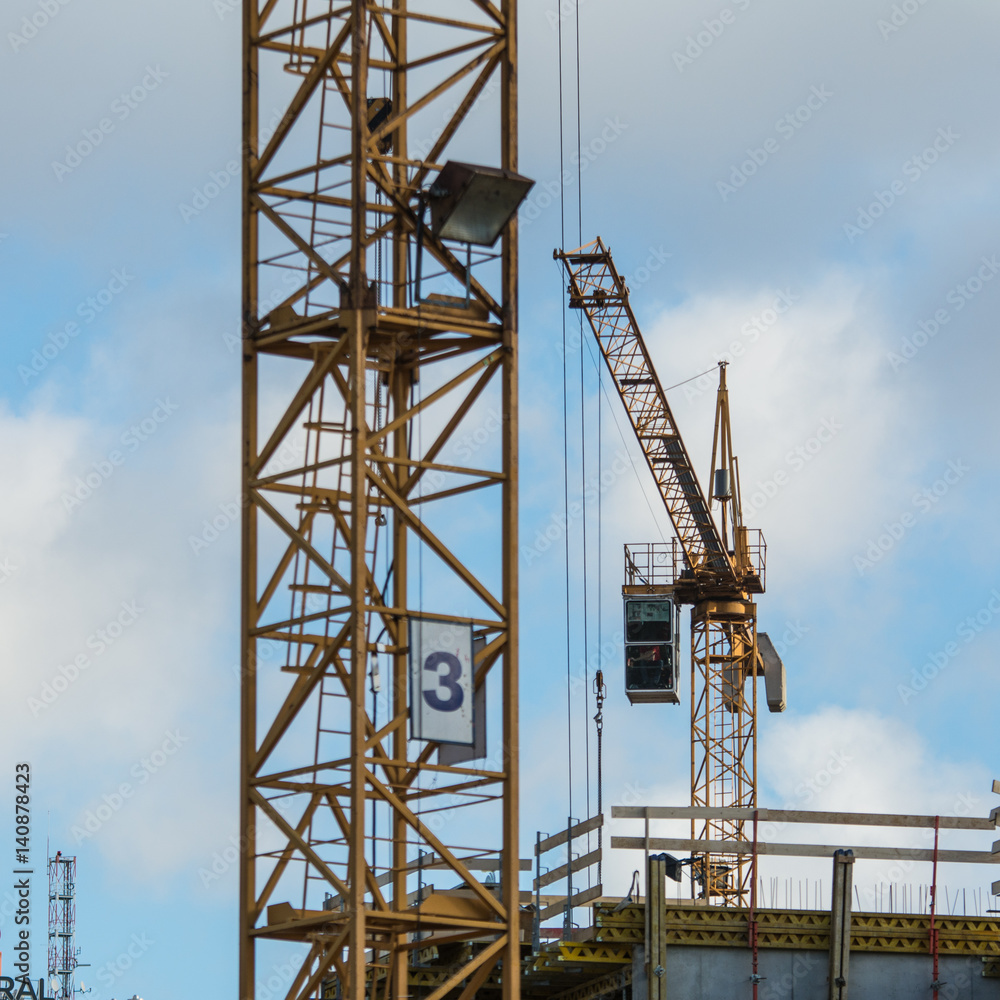 Crane construction development of the city and new investment