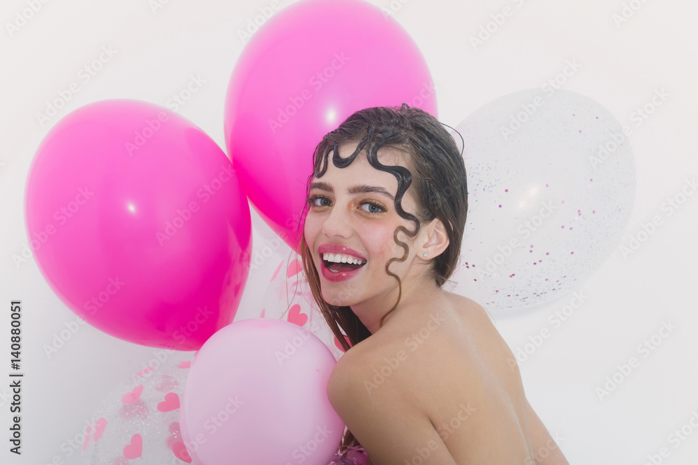 Happy pretty girl with party balloons