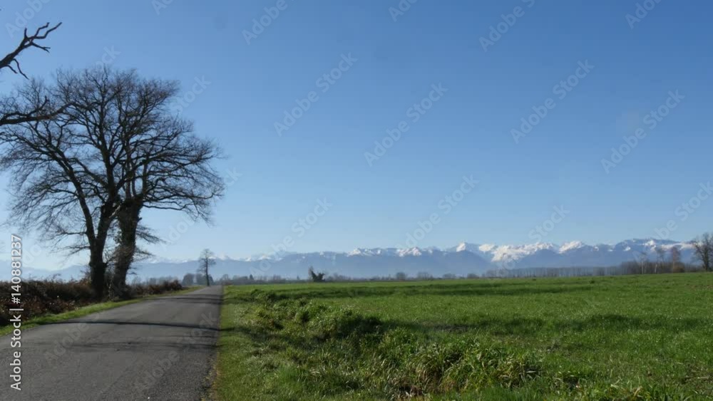 panorama of countryside, Pyrenees mountains in background panorama of countryside, Pyrenees mountains in background