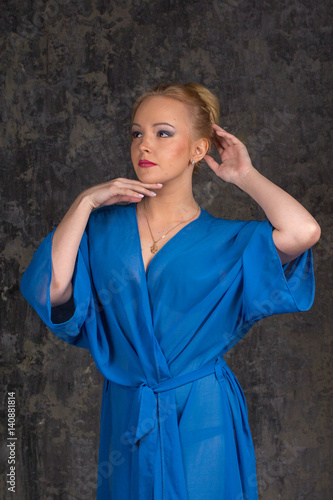 Beautiful breast in blue bathrobe © PaulShlykov