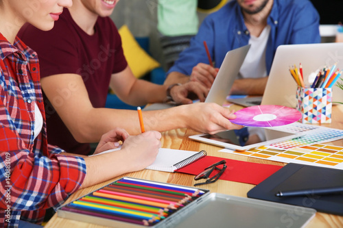Group of young designers wo...