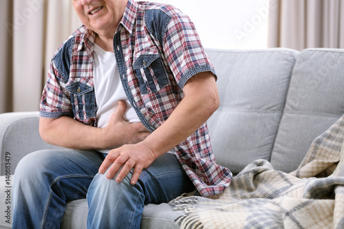 Mature man suffering from p...