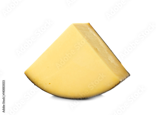 Piece of fresh cheese on white background photo