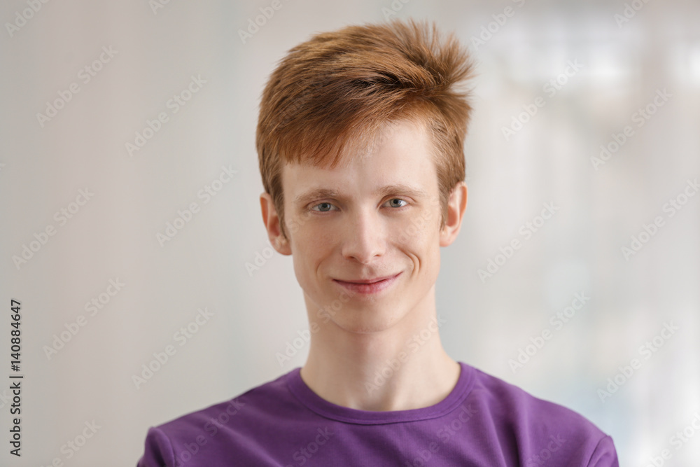 Teenager in casual clothes on blurred background Teenager in casual clothes on blurred background