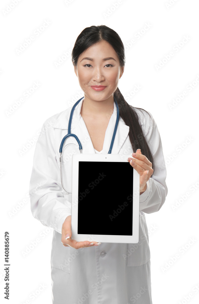 Pretty doctor showing monitor of tablet pc on white background Pretty doctor showing monitor of tablet pc on white background