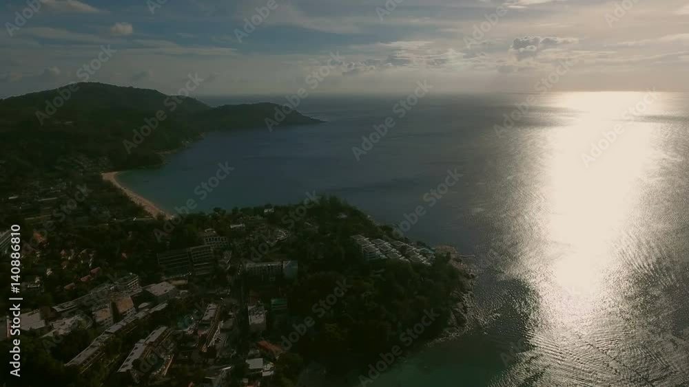 Aerial sunset view of beach and town Aerial sunset view of beach and town