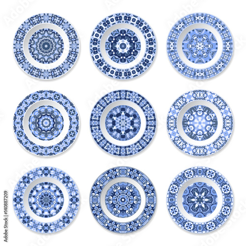 Set of nine decorative plates with a circular blue pattern, top view. White background. Vector illustration.