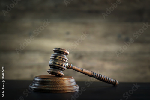 Law and Justice theme, gavel of the judge, wooden rustic desk