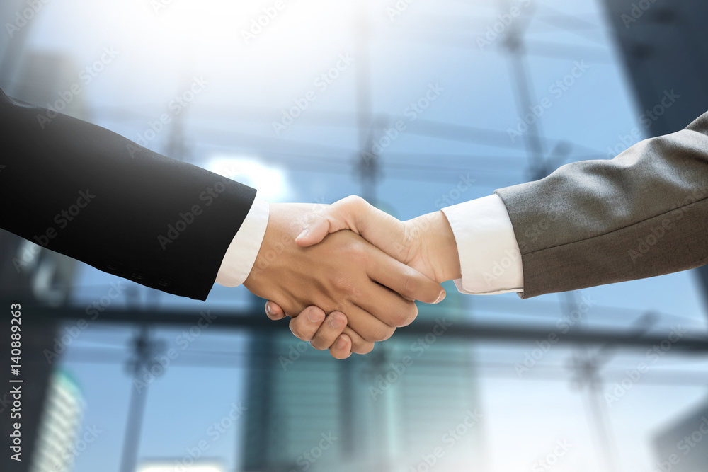 M&A (MERGERS AND ACQUISITIONS) , Businessman handshake working at office M&A M&A (MERGERS AND ACQUISITIONS) , Businessman handshake working at office M&A