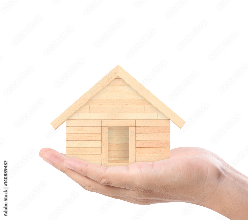 Mortgage concept by house from in hand Mortgage concept by house from in hand