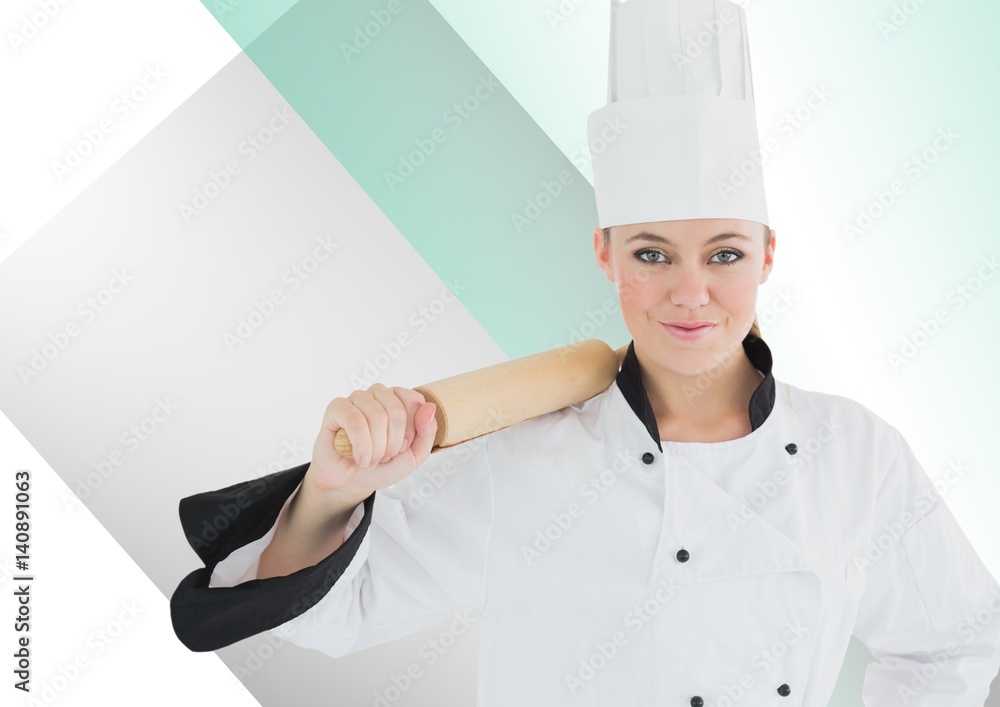 Chef standing with rolling pin against white green background Chef standing with rolling pin against white green background