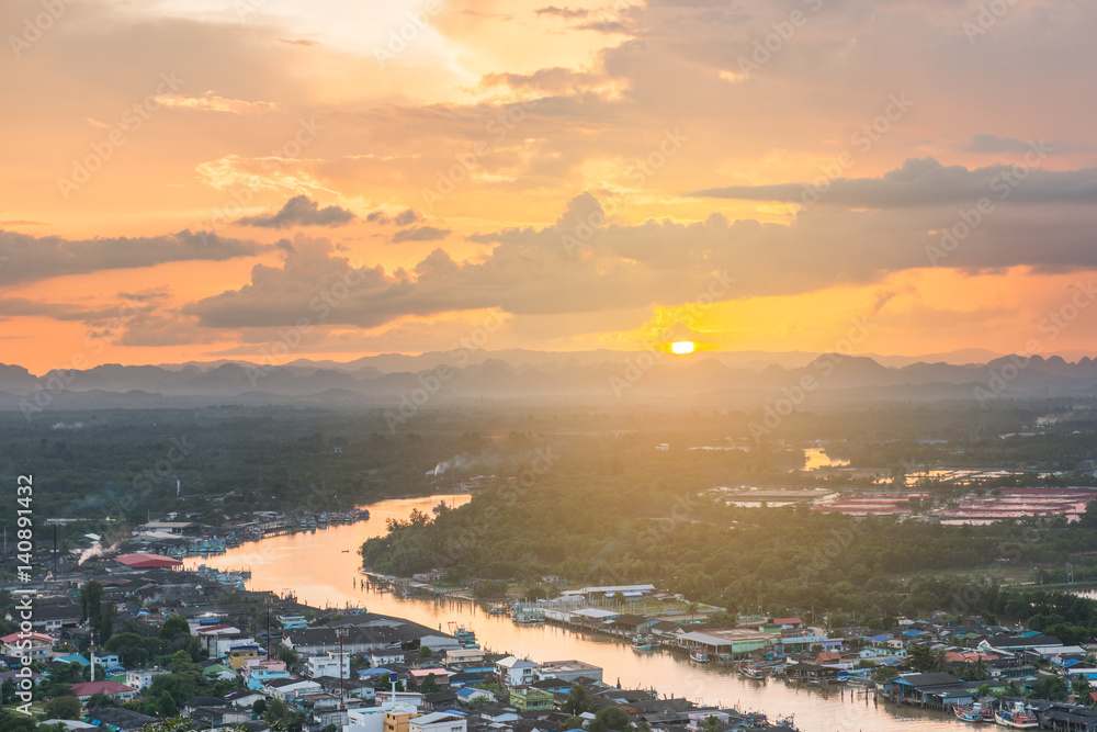 Beautiful sunset over the estuary community view from Mut Sea mountain, Chumphon, Thailand