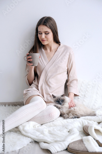 Beautiful young woman with ...