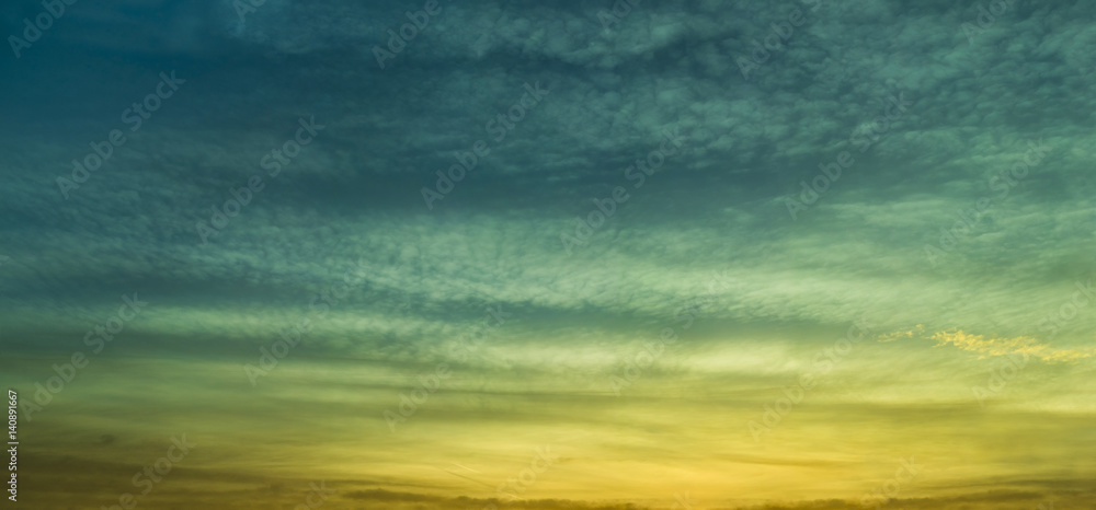 Obraz premium Large cloud panorama at sunrise