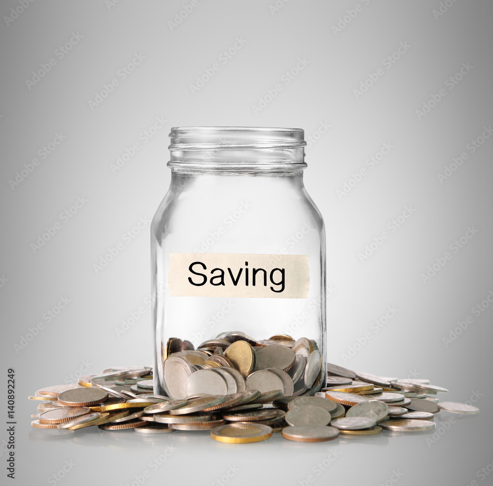 Silver coins in piggy bank Glass Silver coins in piggy bank Glass