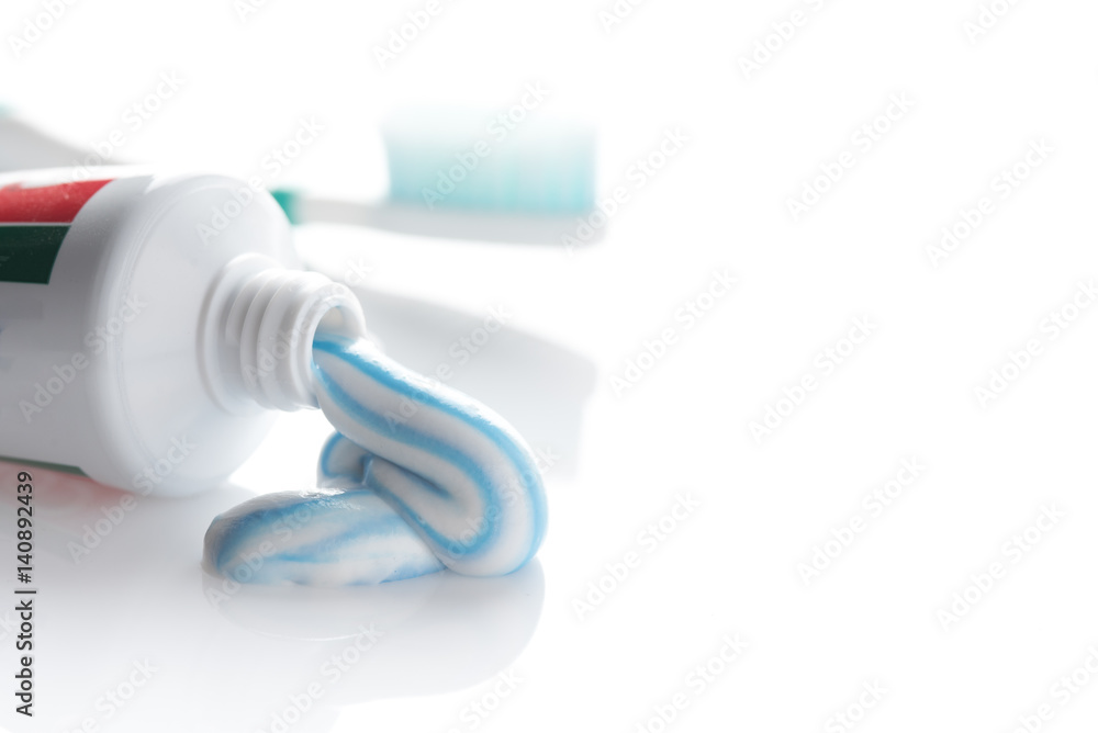 toothpaste and toothbrush on a white background toothpaste and toothbrush on a white background