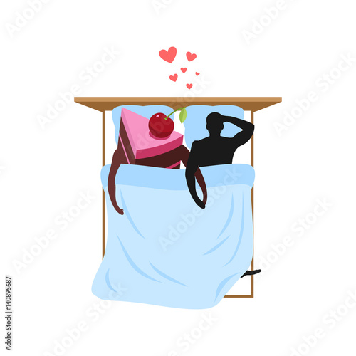 Lover of cakes. Man and piece of cake in bed. Lovers in bedroom. Blankets and pillows. Glutton of Lifestyle