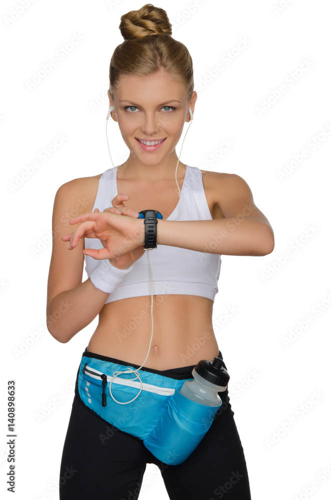 Sports woman controls herself during a workout Sports woman controls herself during a workout
