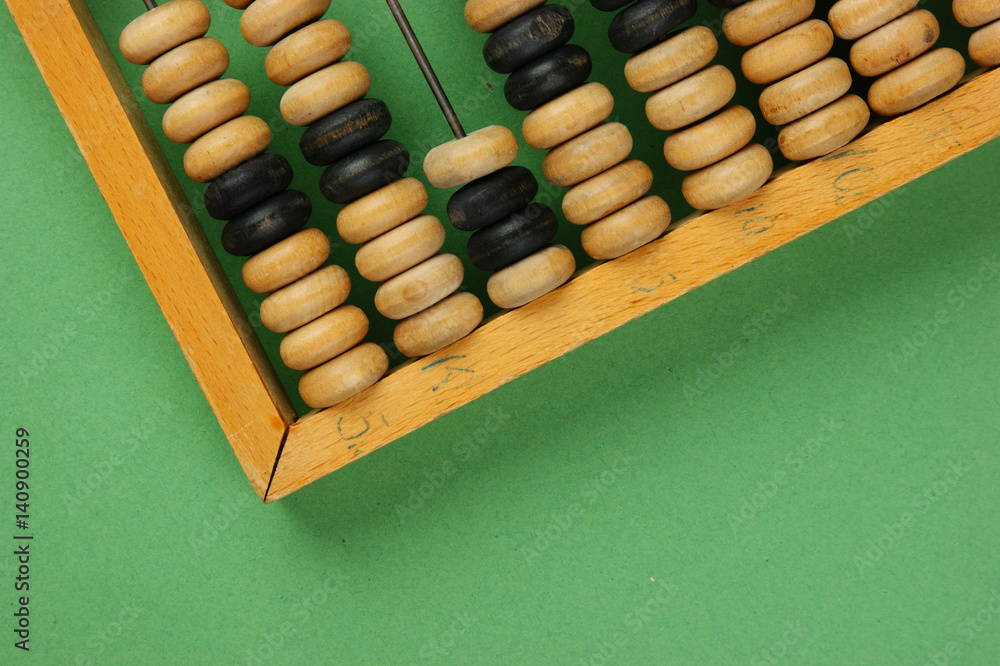 old abacus on the green background old abacus on the green background