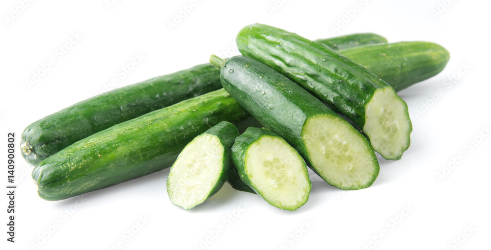 Cucumber and slices isolated over white background. Cucumber and slices isolated over white background.