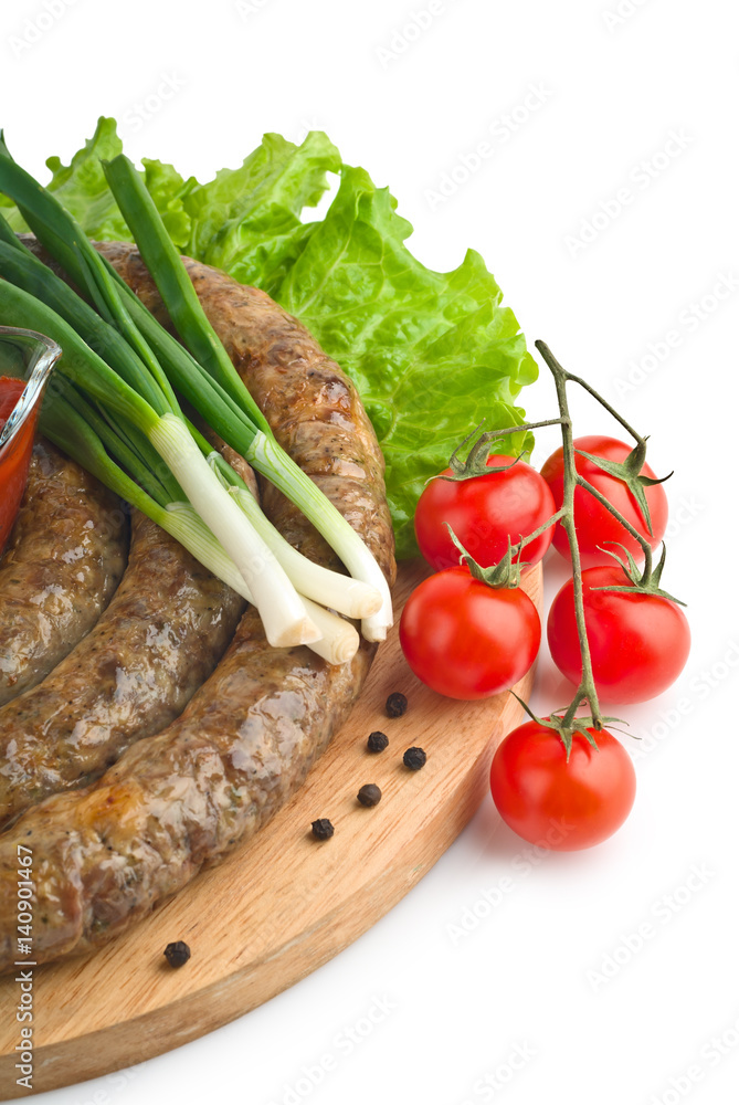 Sausages homemade with vegetables, tomato and green onions Sausages homemade with vegetables, tomato and green onions