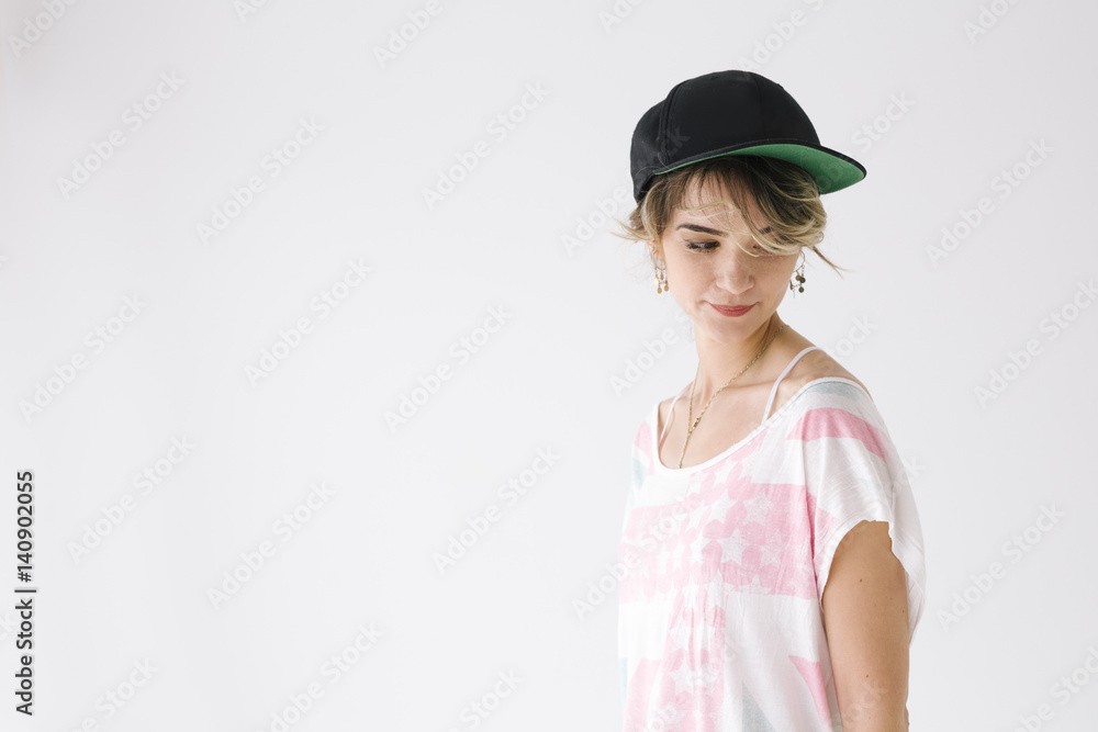 Natural portrait of girl with hat on neutral background Natural portrait of girl with hat on neutral background