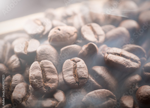 Fotografija Coffee beans roasting with smoke,Selective focus