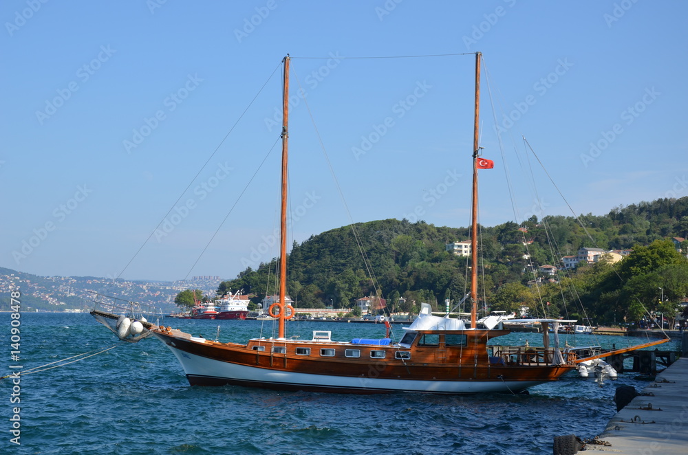 an old boat on the blue waters
