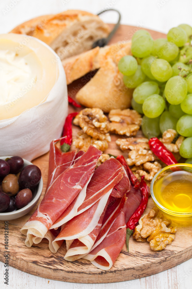 appetizer cheese with smoked meat on board appetizer cheese with smoked meat on board