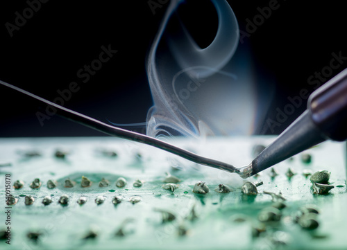 Repair of electronic devices,soldering and circuit board photo