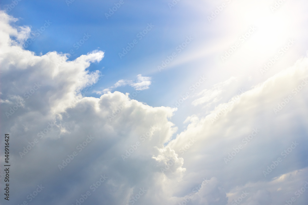 Epic blue sky with white fluffy clouds and sun. Sunny day Epic blue sky with white fluffy clouds and sun. Sunny day