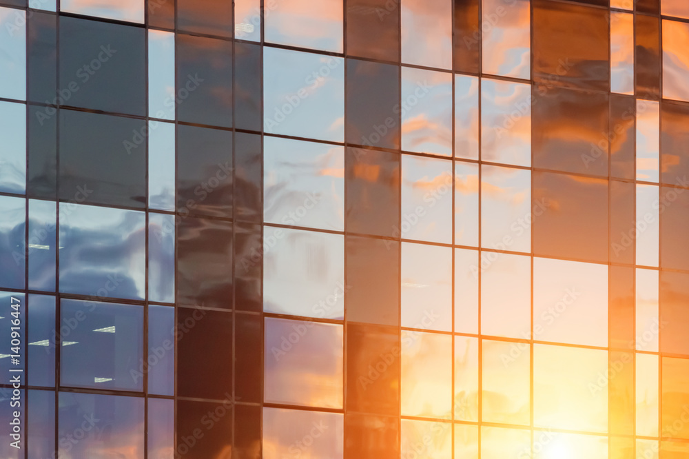 Modern or futuristic architecture reflection in glass with sunset. Abstract construction industry Modern or futuristic architecture reflection in glass with sunset. Abstract construction industry