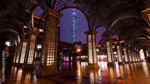 Cityscape nightlife view of Taipei. Taiwan city skyline at twilight time with corridor foreground, public scene from the street